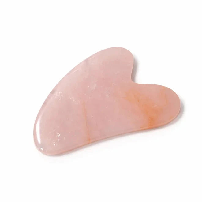 Piedra gua sha de cuarzo rosa en forma de corazón